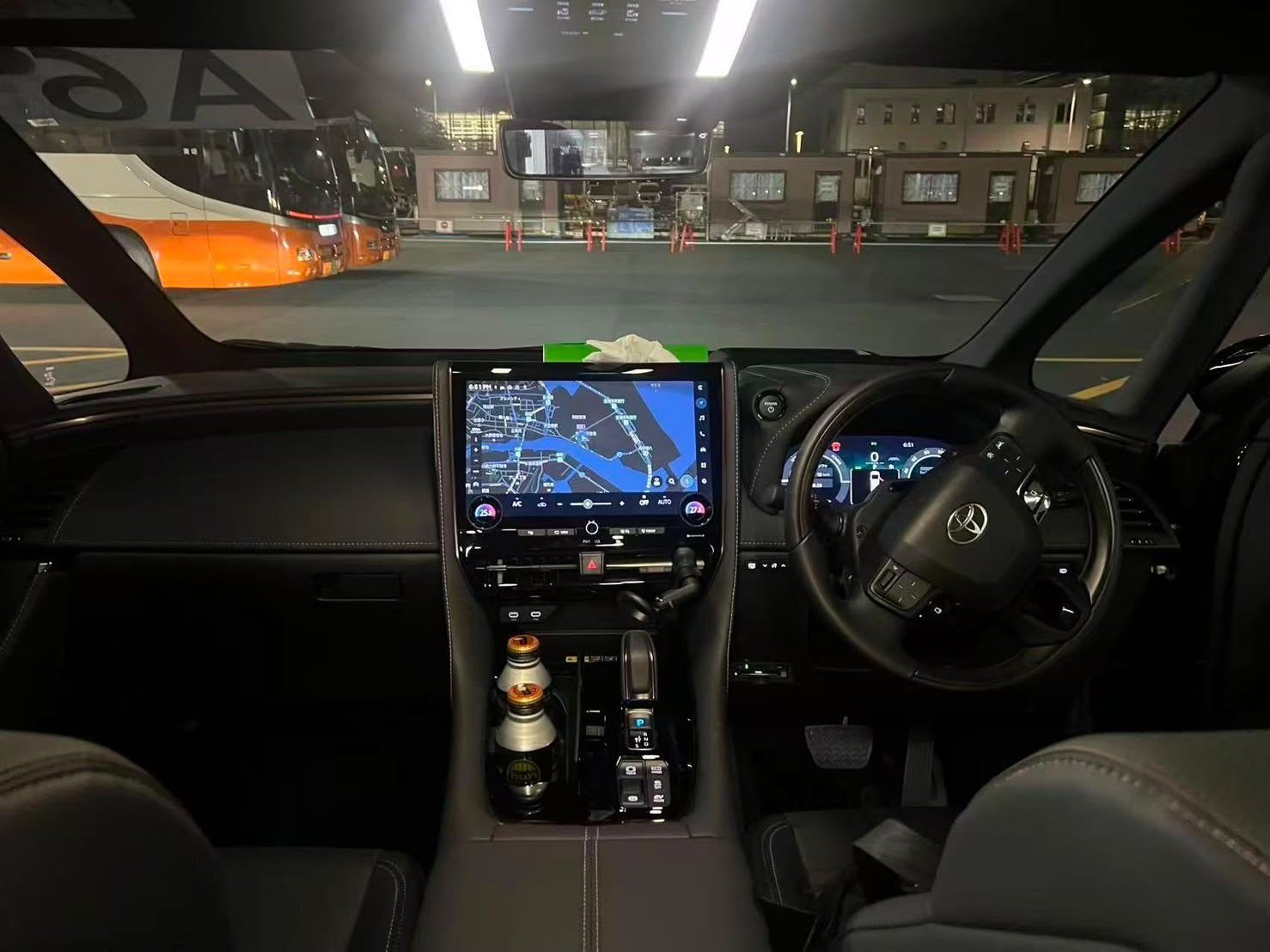 Dashboard with GPS navigation screen and steering wheel
